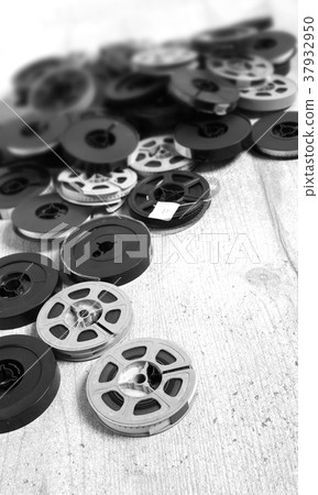 Old movies on a table Old movies on a table 37932950