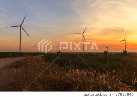 Wind turbine power generator farm at sunset Wind turbine power generator farm at sunset 37933946