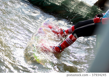 Surfing at the water sports arena. 37934245