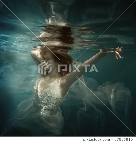 Girl in white dress underwater Girl in white dress underwater 37935910