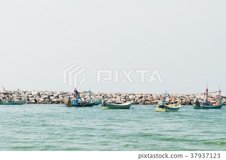 Sea fishing boat parking on coastline 37937123