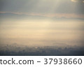 beautiful sunrise landscape with mist 37938660