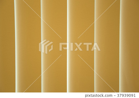 Beautiful soft yellow curtain background. 37939091