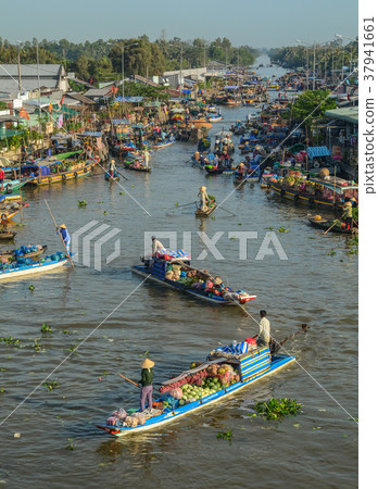 Floating market in Mekong Delta, Vietnam Floating market in Mekong Delta, Vietnam 37941661