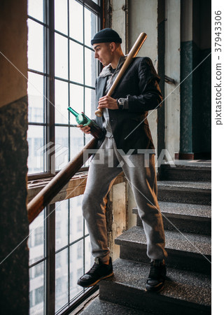 Bad guy with baseball bat and beer Bad guy with baseball bat and beer 37943306