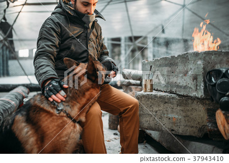 Stalker, post-apocalypse soldier feeding a dog Stalker, post-apocalypse soldier feeding a dog 37943410