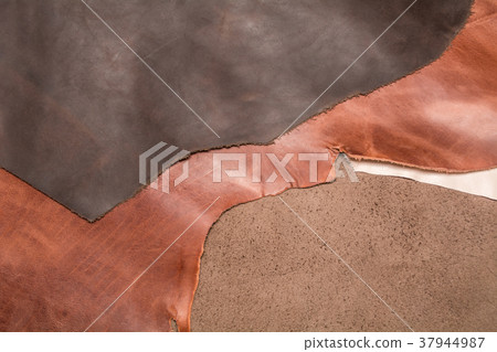 Texture of three pieces of natural brown leather. Leather background. Texture of three pieces of natural brown leather. Leather background. 37944987
