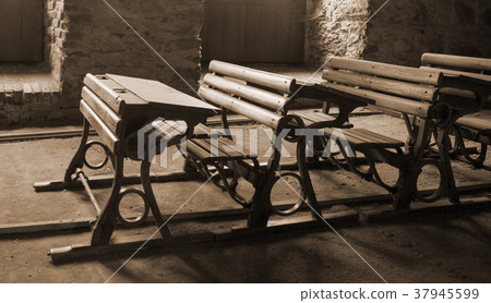 Old dusty pupils' benches Old dusty pupils' benches 37945599