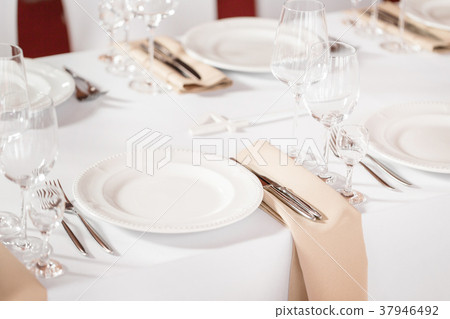 Tables set for an event party or wedding reception 37946492