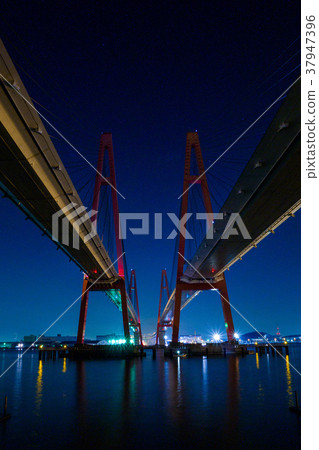 A night view of the famous harbor Triton and the famous harbor West Ohashi (Toshihashi) A night view of the famous harbor Triton and the famous harbor West Ohashi (Toshihashi) 37947396