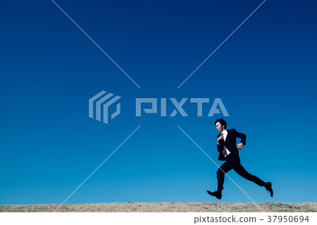 Running businessman Japanese male 37950694