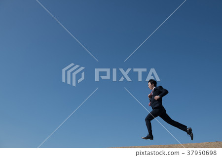 Running businessman Japanese male 37950698