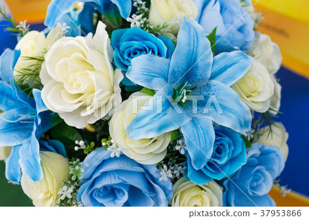 The colorful plastic flower The colorful plastic flower 37953866