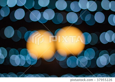 Lights blurred bokeh background from night party. 37955226