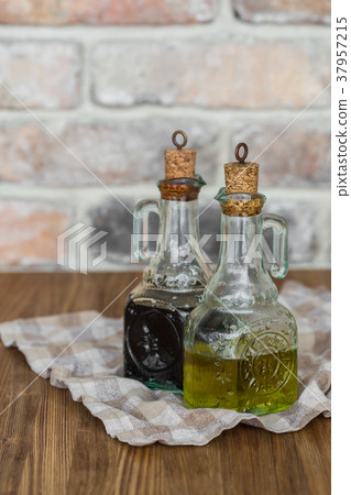 Oil and balsamic vinegar glass bottles with spouts Oil and balsamic vinegar glass bottles with spouts 37957215