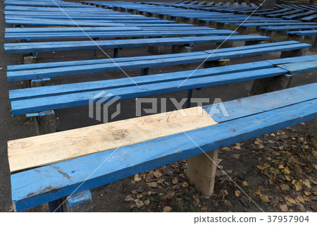 Blue wooden benches with unpainted part Blue wooden benches with unpainted part 37957904