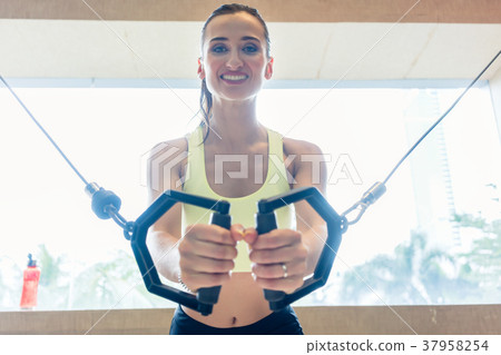 Low-angle view portrait of a cheerful beautiful 37958254