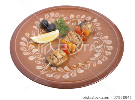 Sturgeon shish kebab with vegetables. 37958945