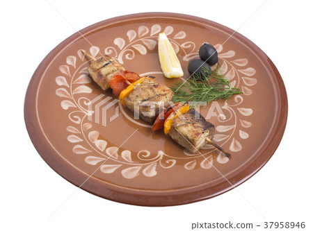Sturgeon shish kebab with vegetables. 37958946