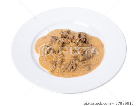 Roast meat in a white sauce. Roast meat in a white sauce. 37959013