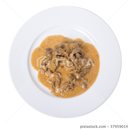 Roast meat in a white sauce. Roast meat in a white sauce. 37959014