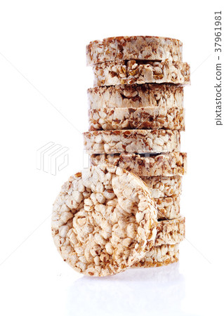 Round wheat crispbread, white background Round wheat crispbread, white background 37961981