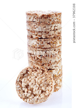 Round wheat crispbread, white background Round wheat crispbread, white background 37962108