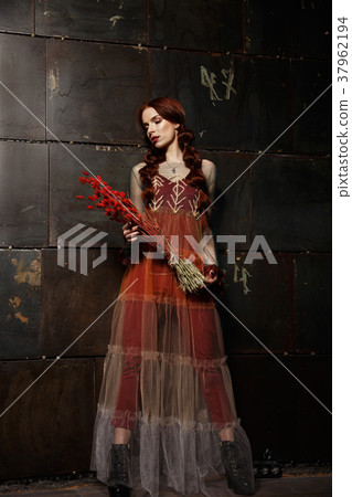 Beautiful girl in designer fashionable transparent Beautiful girl in designer fashionable transparent 37962194