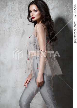 Beautiful girl in designer fashionable transparent Beautiful girl in designer fashionable transparent 37962202