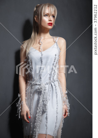 Beautiful girl in designer fashionable transparent Beautiful girl in designer fashionable transparent 37962212