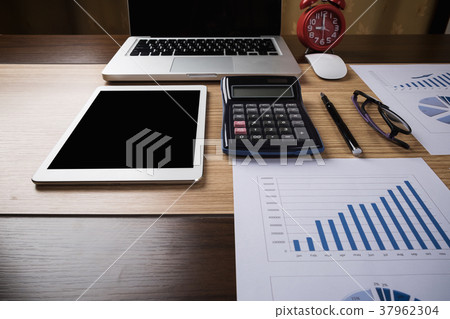 Desk office with laptop,tablet analysis report Desk office with laptop,tablet analysis report 37962304