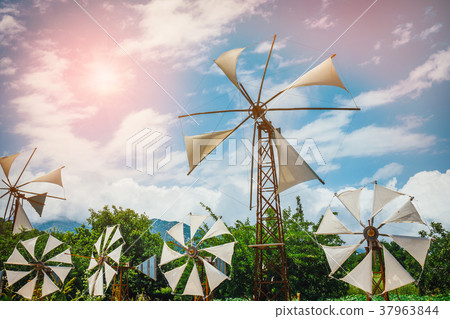Old-style windmills on Lasithi Plateau. Crete Old-style windmills on Lasithi Plateau. Crete 37963844