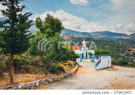 White chapel and mountains, Crete Island, Greece 37963907