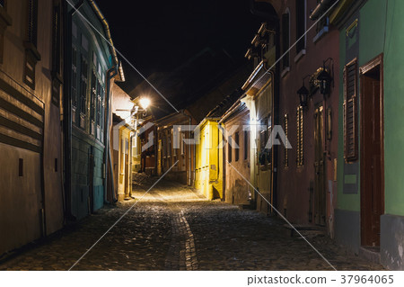 Night view of historic town Sighisoara 37964065