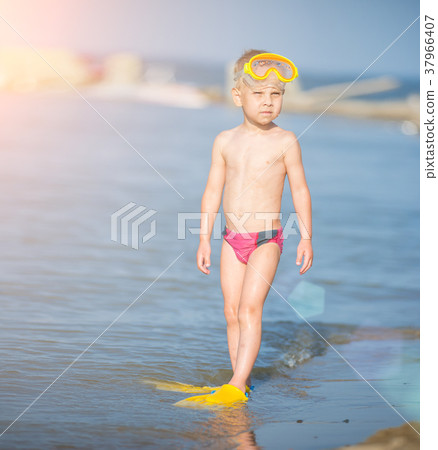 Cute little kid wearing mask and flippers for Cute little kid wearing mask and flippers for 37966407