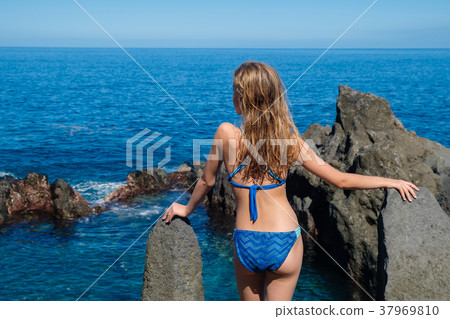 beautiful girl resting in natural ocean swimming beautiful girl resting in natural ocean swimming 37969810