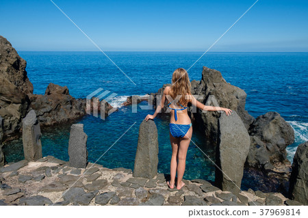 beautiful girl resting in natural ocean swimming beautiful girl resting in natural ocean swimming 37969814
