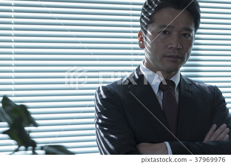 Middle businessman thinking Middle businessman thinking 37969976