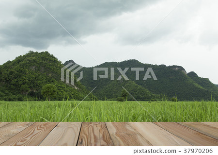 Mountain and sky with wooden space. Mountain and sky with wooden space. 37970206