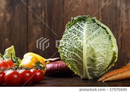Raw savoy cabbage with vegetables 37970890
