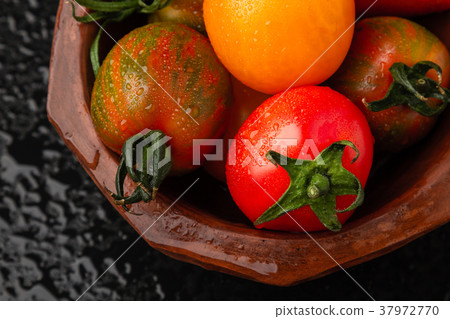 tomatoes and pepper in a bowl tomatoes and pepper in a bowl 37972770