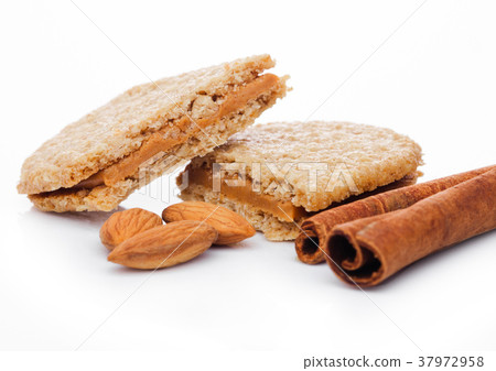 Healthy bio breakfast grain biscuits with almonds 37972958