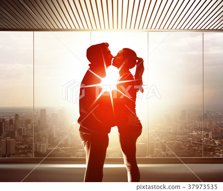 couple of young lovers at sunset 37973535