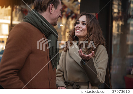 Joyful man and woman enjoying communication Joyful man and woman enjoying communication 37973610