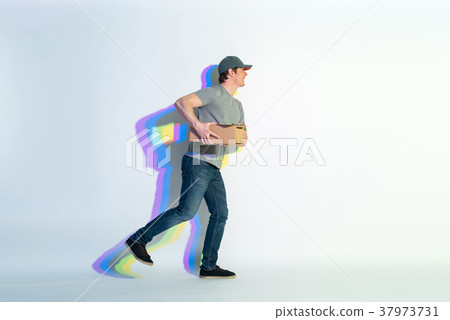 Outgoing male going with parcel and document 37973731