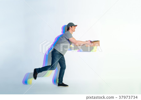 Cheerful male going with parcel 37973734
