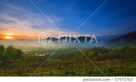 Fog in the Bieszczady Mountains at sunrise 37973763