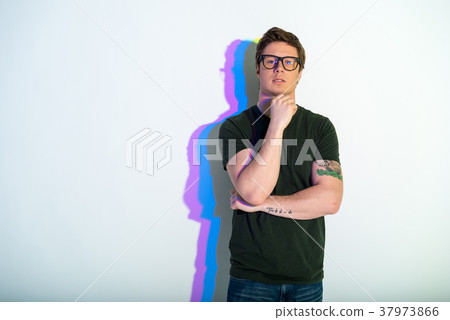 Pensive male making serious decision Pensive male making serious decision 37973866