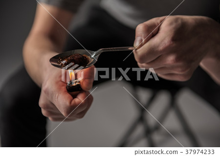 Freak melting drugs with help of lighter 37974233