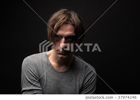 Sad narcomaniac having unhealthy appearance Sad narcomaniac having unhealthy appearance 37974246